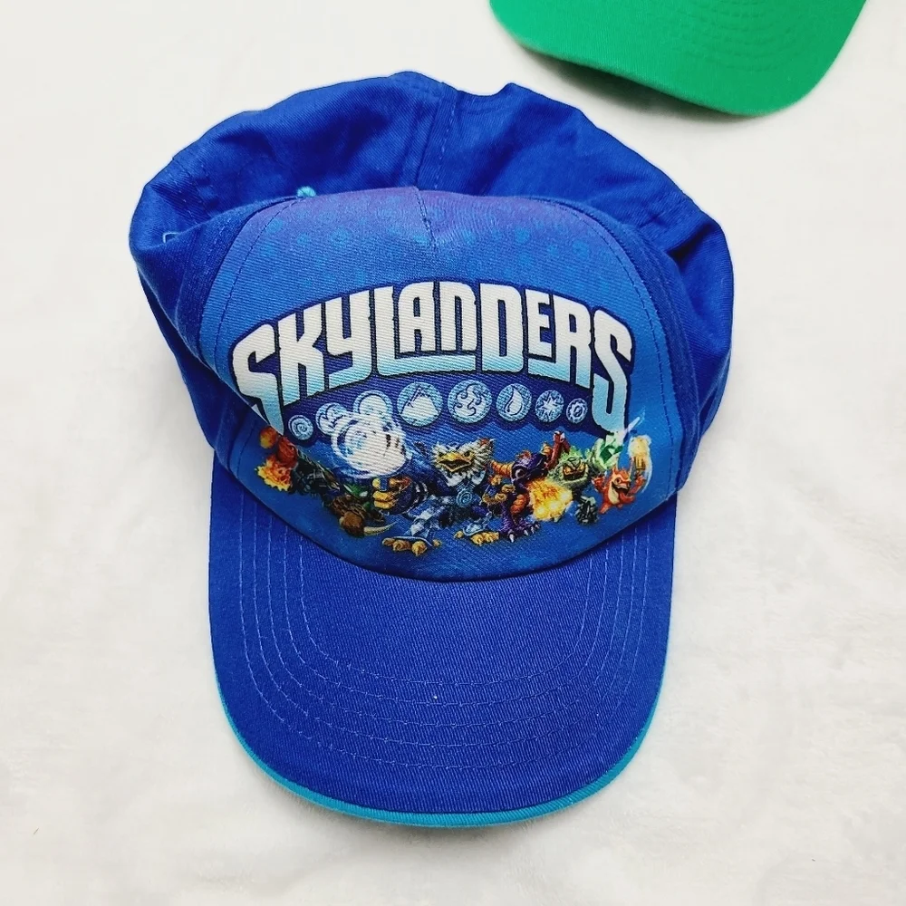 4 X bundle of hats jinx, skilanders,batman( one size) , h&m(4-6)